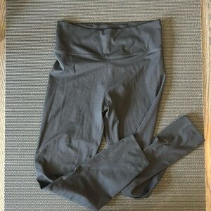 Like new Nike women’s size M black 7/8 leggings